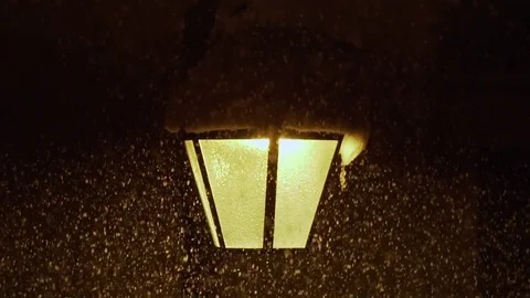 Old Fashioned Lantern street lantern in night heavy snowfall Stock Footage 84792482