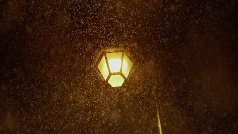 Old Fashioned Lantern street lantern in night heavy snowfall Stock Footage 84792790