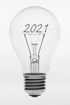 Old fashioned light bulb with the text two thousand and twenty one. Stock Photos