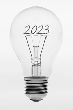 Old fashioned light bulb with the text two thousand twenty-three . Stock Photos