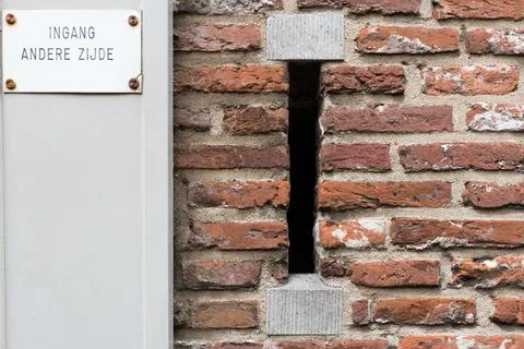 Old fashioned mailbox in brick wall, Utrecht, the Netherlands Stock Photos