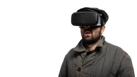 Old fashioned man develops virtual reality headset. Comical style Stock Photos