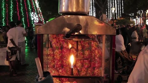 Old fashioned popcorn maker in town square of Cali during holidays Stock Footage 70794463