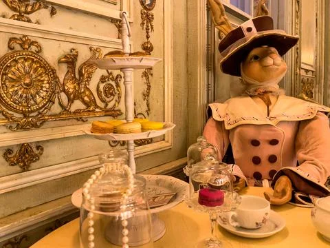An old-fashioned rabbit drinks tea Stock Photos