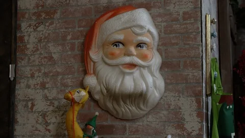 Old Fashioned Santa Head on Brick Wall Stock Footage 121814872