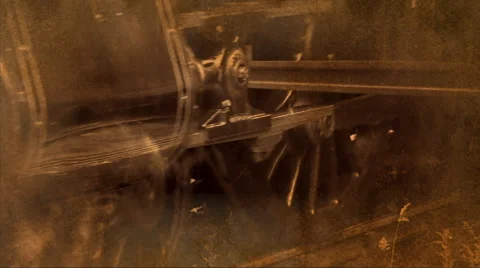 Old fashioned shot of steam train running along tracks Stockbeeldmateriaal 65050601