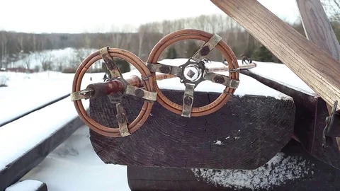 Old fashioned ski equipment on the bench. Video stock 71463325