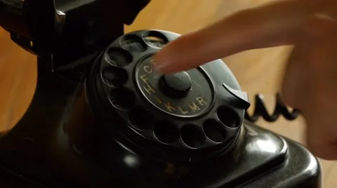 Old fashioned telefon - Man dials Stock Footage 52450769