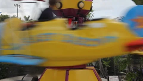 Old Fashioned Theme Park  Airplane Ride Very Close #2 Stock Footage 7732868