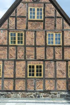Old fashioned Timber Frame Facade with Classic Bricks pattern in Lund Stock Photos