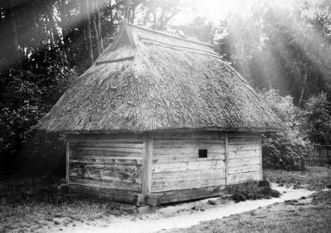 Old fashioned timber house in XIX century village in the middle of the forest Stock Photos
