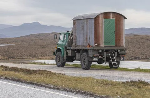 Old fashioned tin shed on the back of a truck Stock Photos