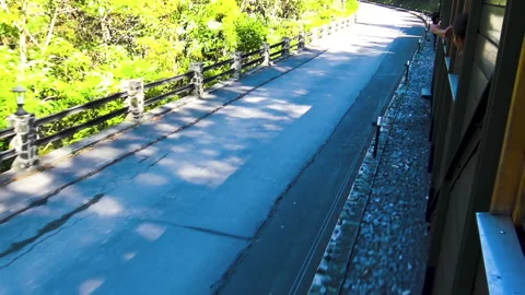 Old fashioned train with passengers passing trough in Mokra Gora. Video stock 162689519
