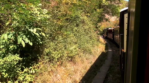Old fashioned train passing trough landscape. Video stock 162672162