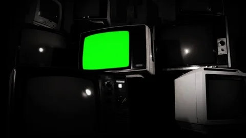 Old Fashioned TV with Green Screen with Many Retro TVs. BW Tone. Stock Footage 88481633