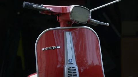 Old-fashioned Vespa Piaggio 50 special, red color Stock Footage 118423504