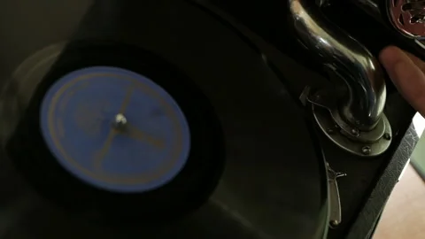 Old fashioned vinyl player. Retro romantic evening with analog music. Stock Footage 129881758