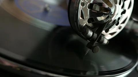 Old fashioned vinyl player. Retro romantic evening with analog music. Stock Footage 129883558