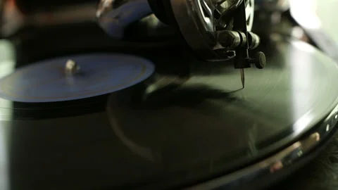 Old fashioned vinyl player. Retro romantic evening with analog music. Stock Footage 129884307