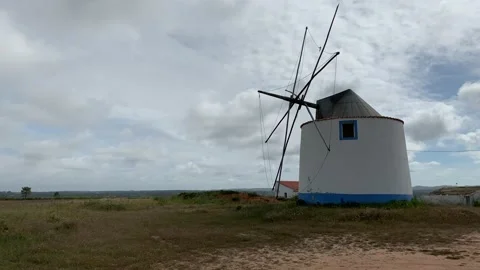 Old fashioned wood windmill with copy space Stock Footage 107731912