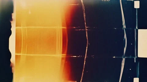 Old film analog background with flicker frames from optic film projector Stock Footage 297259136