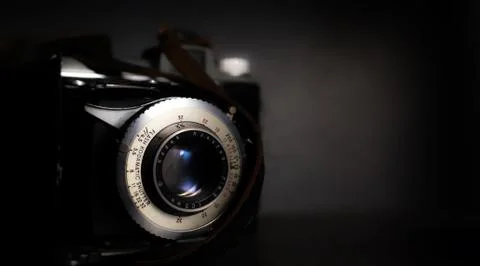 Old film camera with dramatic lighting.  写真素材