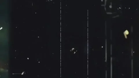 Old Film Grain Texture Overlay with Camera Dust and Vertical Scratches Stock Footage 336295161