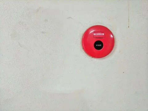 Old fire alarm button on old wall Foto stock
