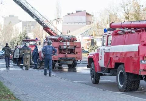 Old fire engine, fire brigade. Fire extinguishing. Stock Photos