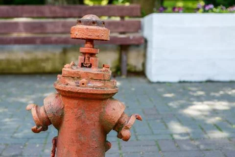 Old fire hydrant on the pavement Stock Photos