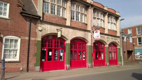 Old fire station now converted to shops and restaurants in Market Harborough. Video stock 172497757