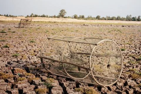Old fish trap on ground. Stock Photos