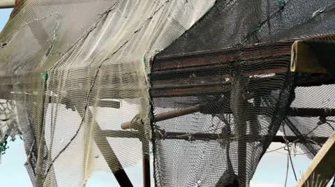 Old fishing nets and machinery Stock Footage
