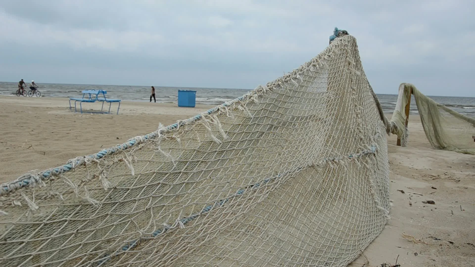 old fishing nets on sea beach, Stock Video