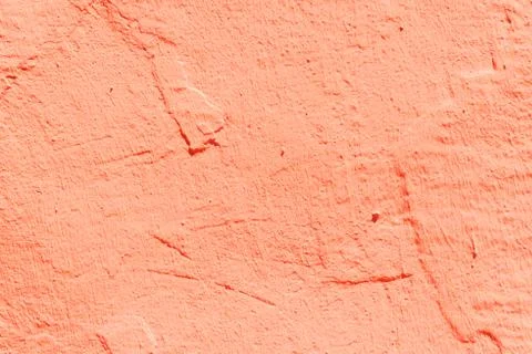 Old flaky paint peeling off on old wall, cracks and scrapes on the surface Stock Photos