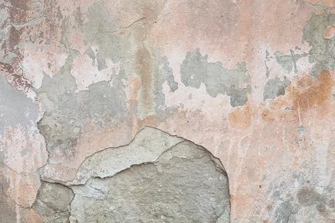 Old flaky wall with destroyed plaster. Renovation of old house. Industrial st Stock Photos