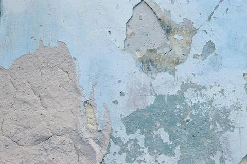 Old flaky wall with destroyed plaster. Renovation of old house. Industrial st Stock Photos