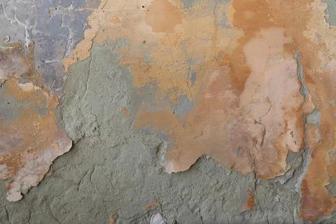 Old flaky wall with destroyed plaster. Renovation of old house. Industrial st Stock Photos