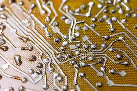 Old flat bare fiberglass pcb without components with selective f Фото