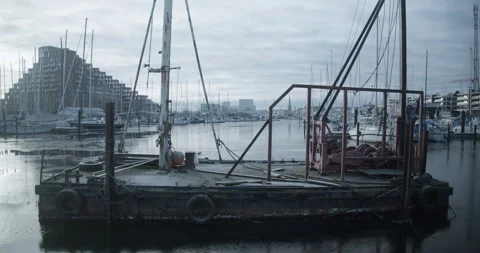 Old Flat-Bottomed Barge And Docked Boats Stock Footage 274746696