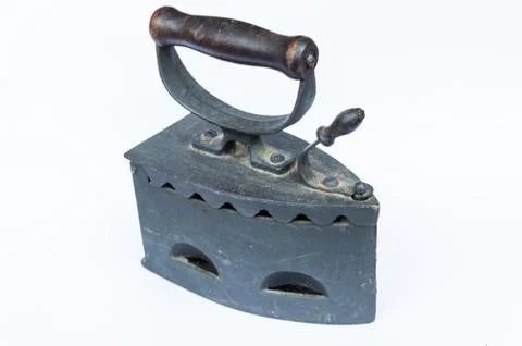 Old flatiron on white background Stock Photos