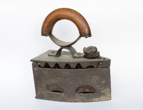 Old flatiron on white background Stock Photos