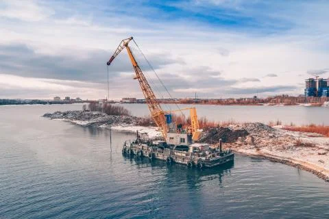 Old floating crane. Stock Photos