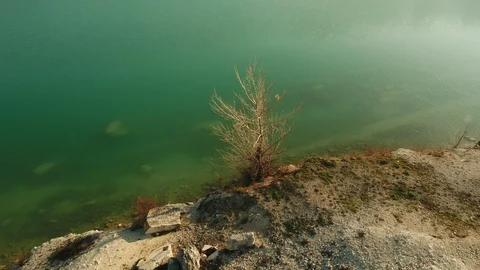 Old flooded quarry Stock Footage 122883834