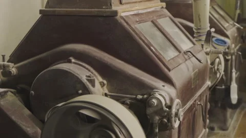 Old flour grinding machine Stock Footage 210227174