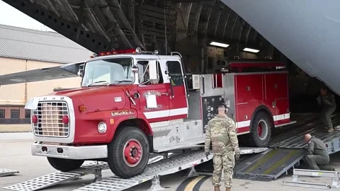 Old Ford fire truck reversing up ramps o... | Stock Video | Pond5