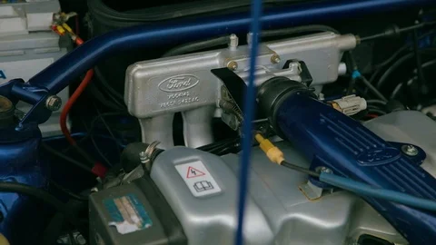 Old Ford gasoline engine blue color slow motion Stock Footage 119666186