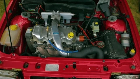 Old Ford gasoline engine red car color slow motion Stock Footage 119666233