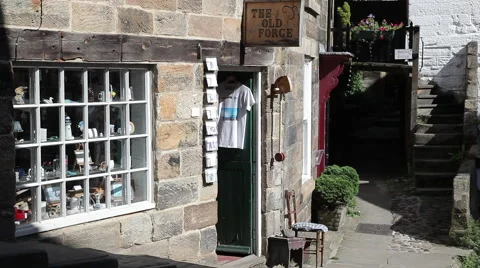 THE OLD FORGE ANTIQUE SHOP, ROBIN HOOD'S BAY, NORTH YORKSHIRE Stock Footage 46233934