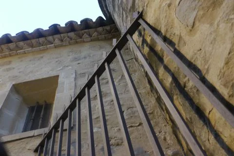 Old forge gate and stone building Stock Photos